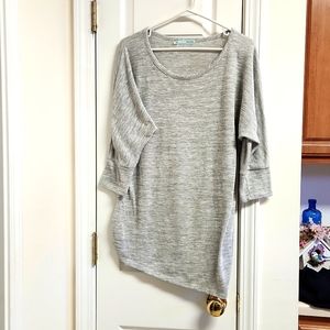 Maurices Shimmering Tunic with Asymmetrical Hem.